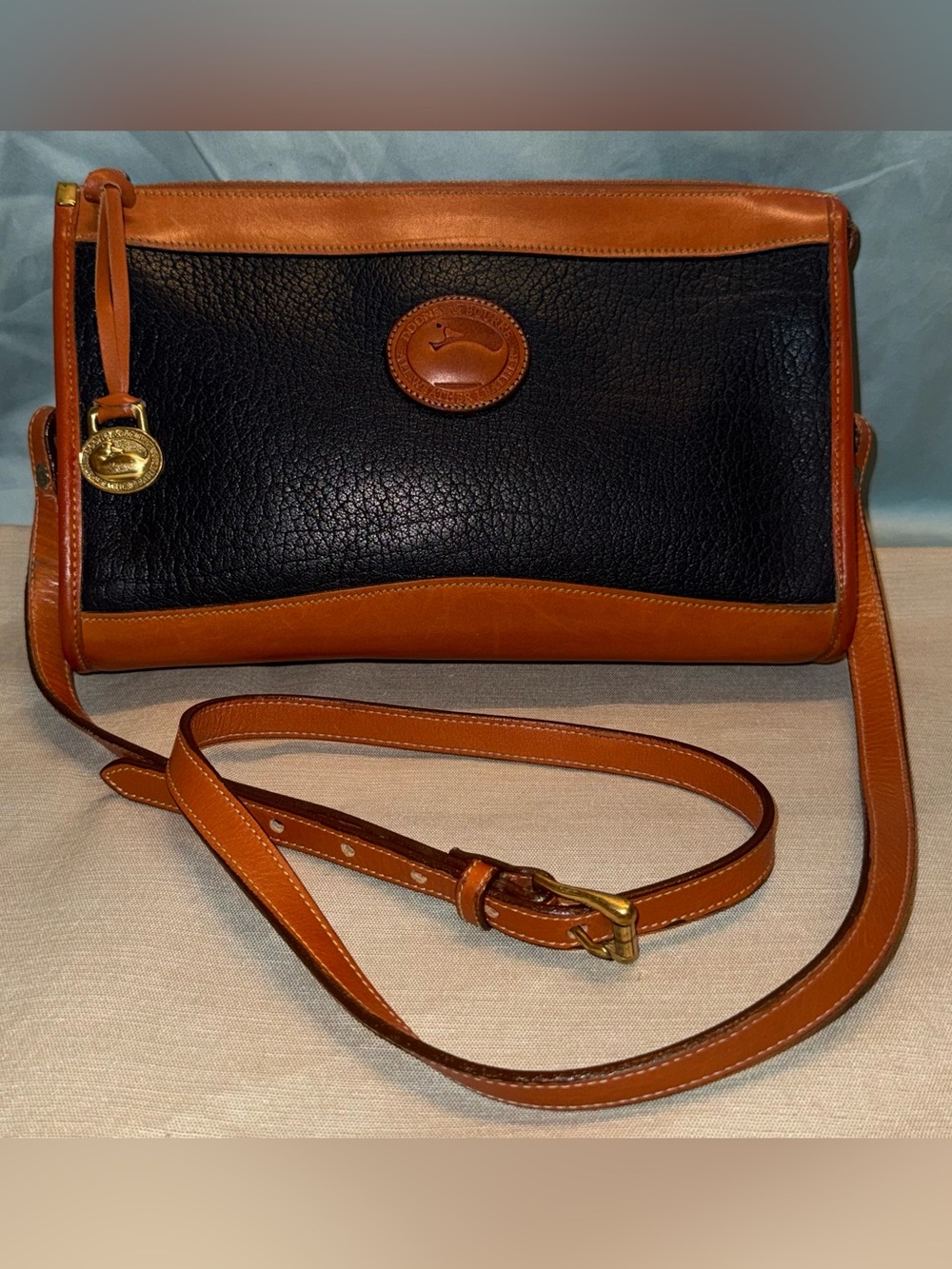 Dooney & Bourke Vintage Navy and Brown All Weather Leather Crossbody